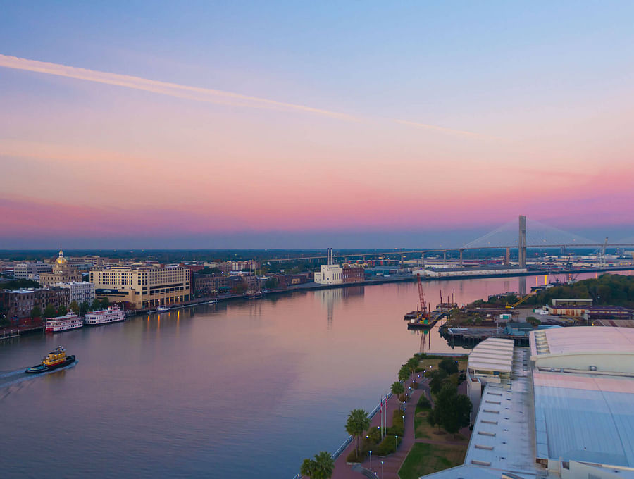 Sunset view of Savannah River and River Street East
